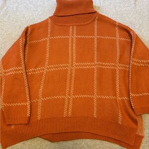 Orange Checkered Turtleneck Sweater